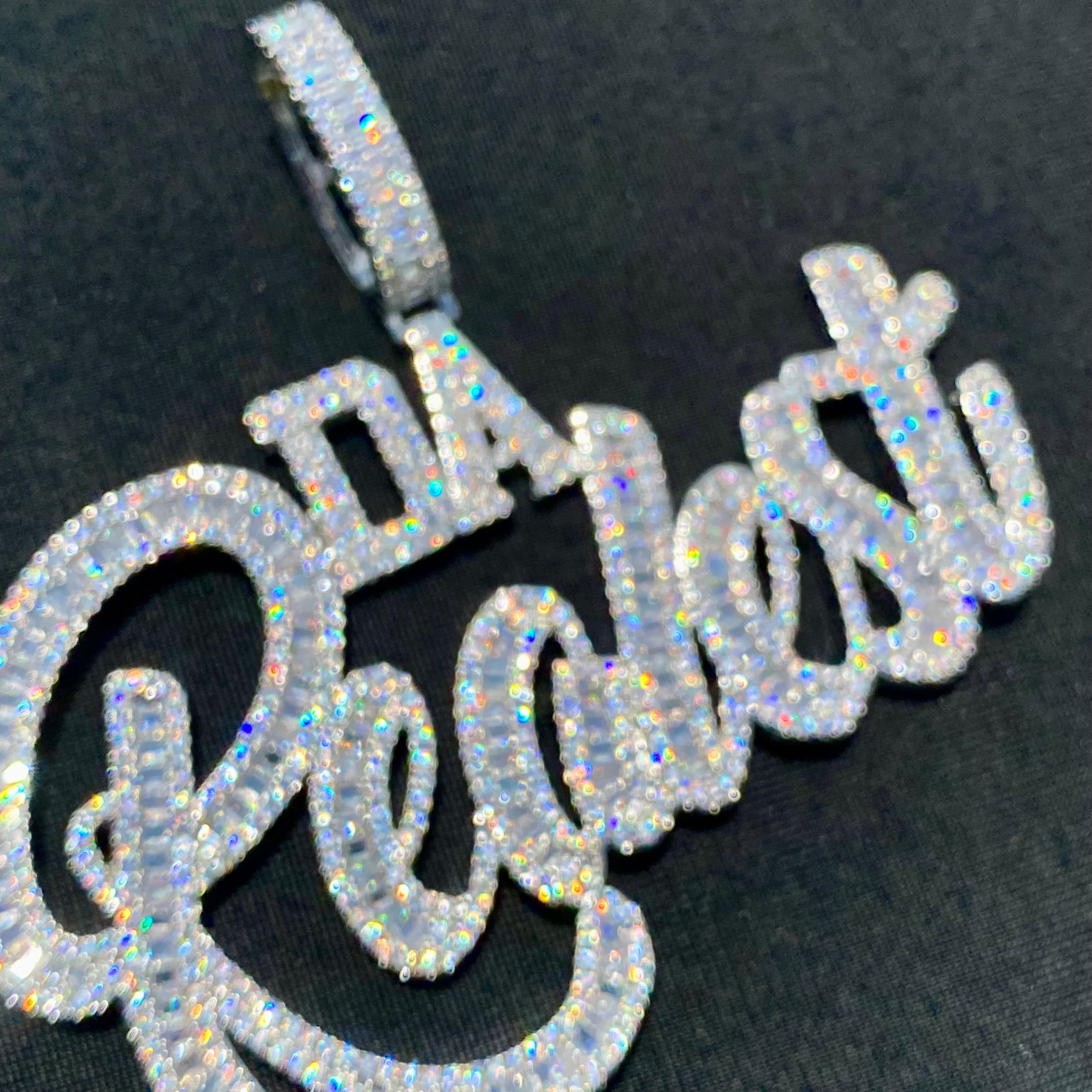 Iced Out “Da Realist” Baguette Pendant